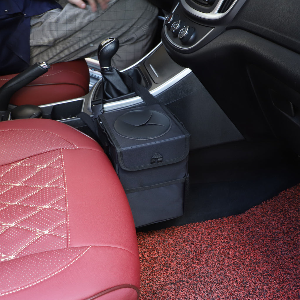 BinIt car trash can strapped beside the centre console