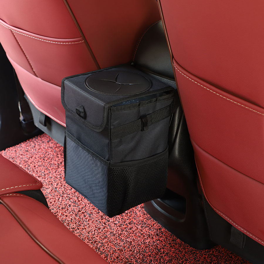BinIt car trash can standing in the front footwell beside the seat