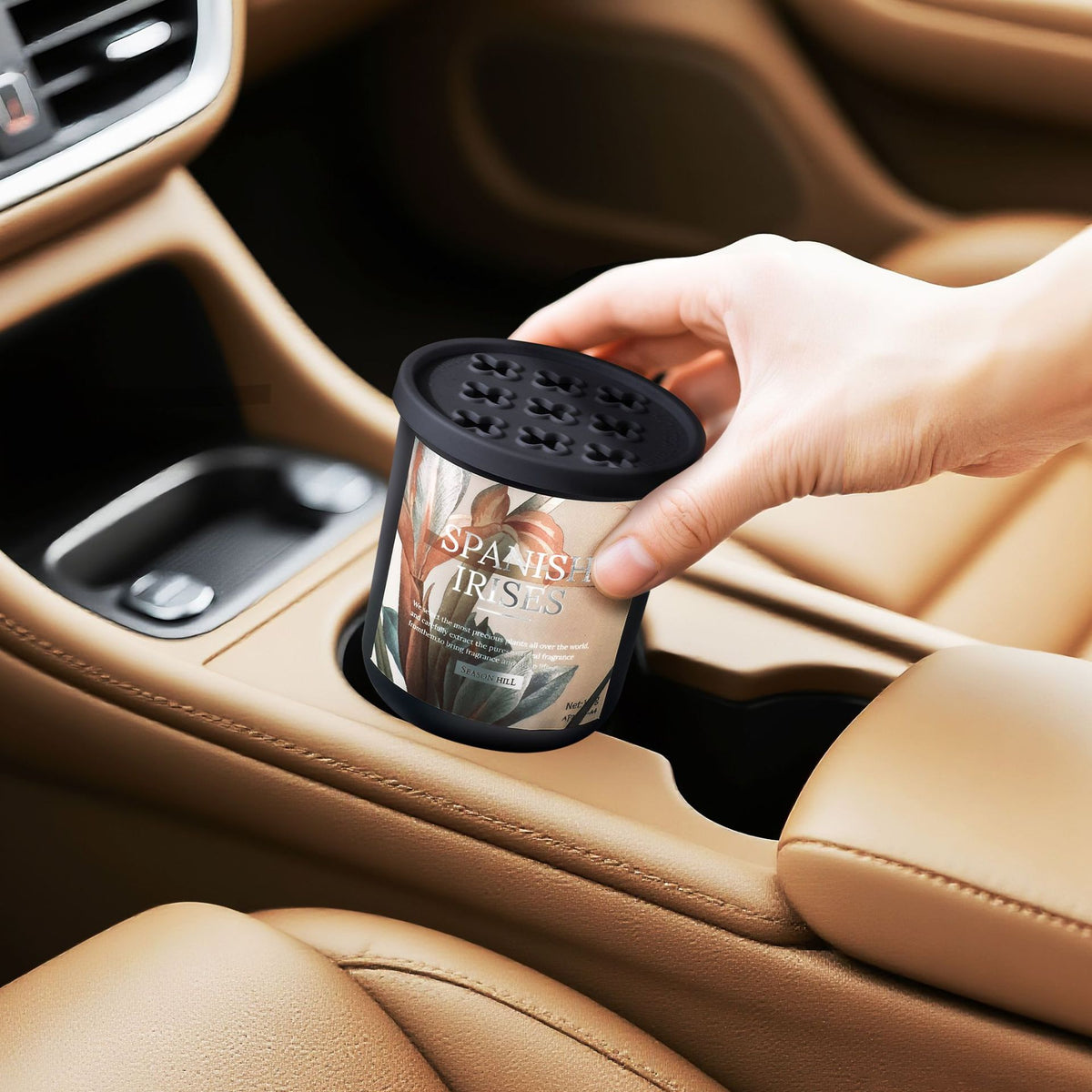 Solid balm air freshener placed in a car cup holder