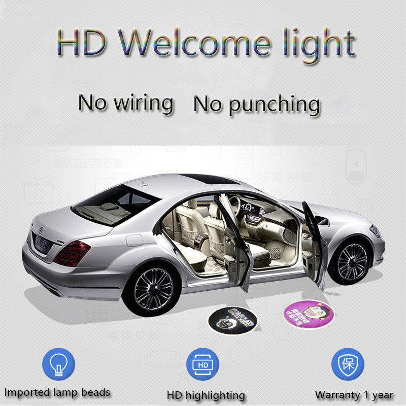 Welcome Kit — HaloStep projector casting a beam onto the ground beside an open car door