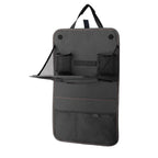 Seat back organizer pockets filled with travel items