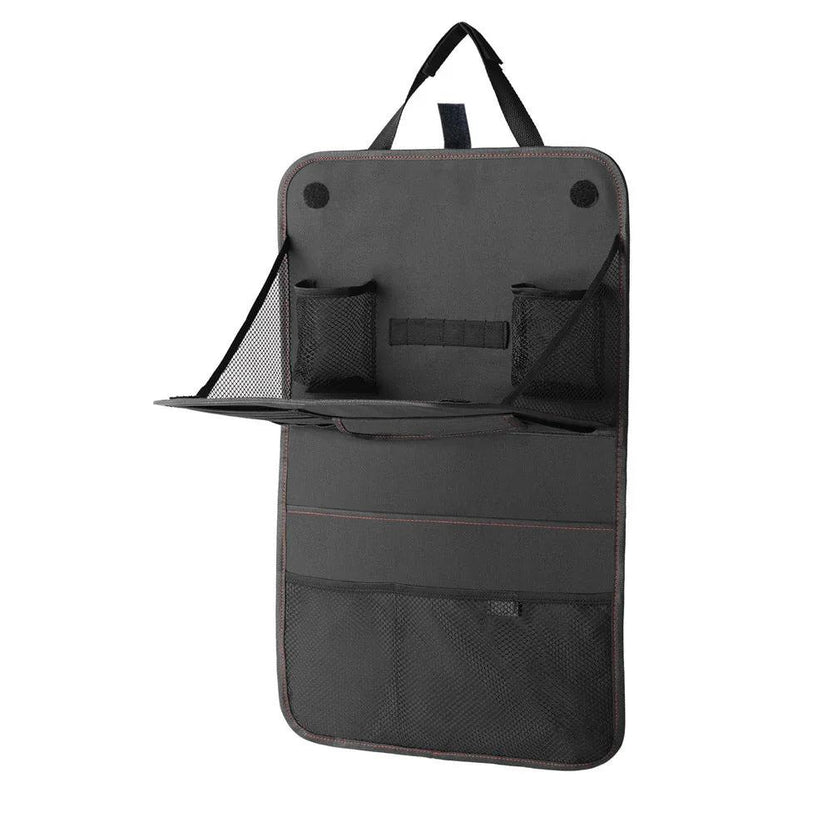 Seat back organizer pockets filled with travel items