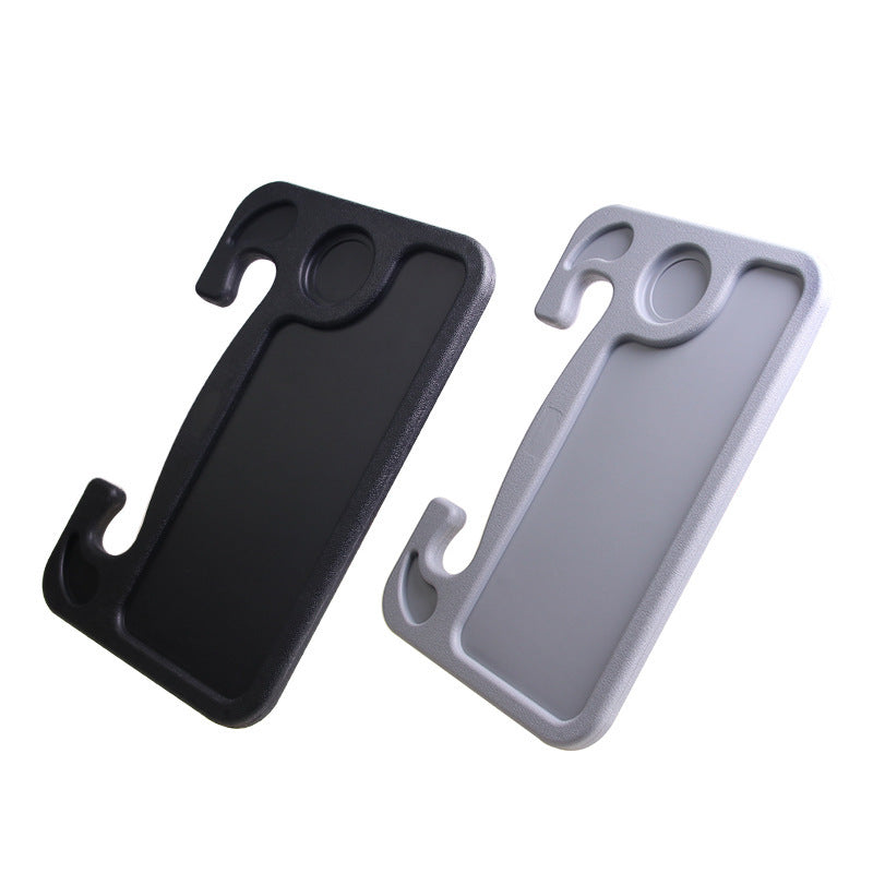 The steering wheel desk tray in both black and grey