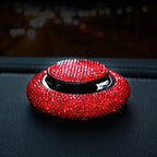 Prism crystal car fragrance bottle on a dashboard