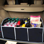Three-compartment collapsible trunk organizer loaded with groceries and drinks in the boot of a car