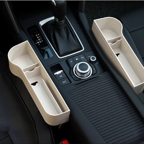 GapVault storage boxes fitted either side of the centre console in a car