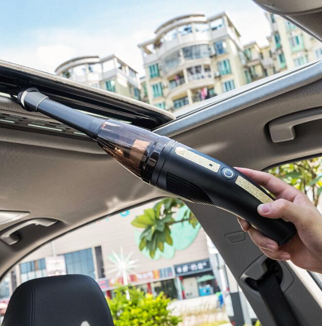 Clean Cabin Kit — the GearVac cordless vacuum cleaning a car seat