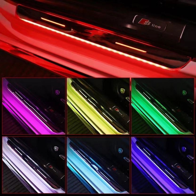 LED door sill plate shown in red, purple, yellow, green and blue light modes