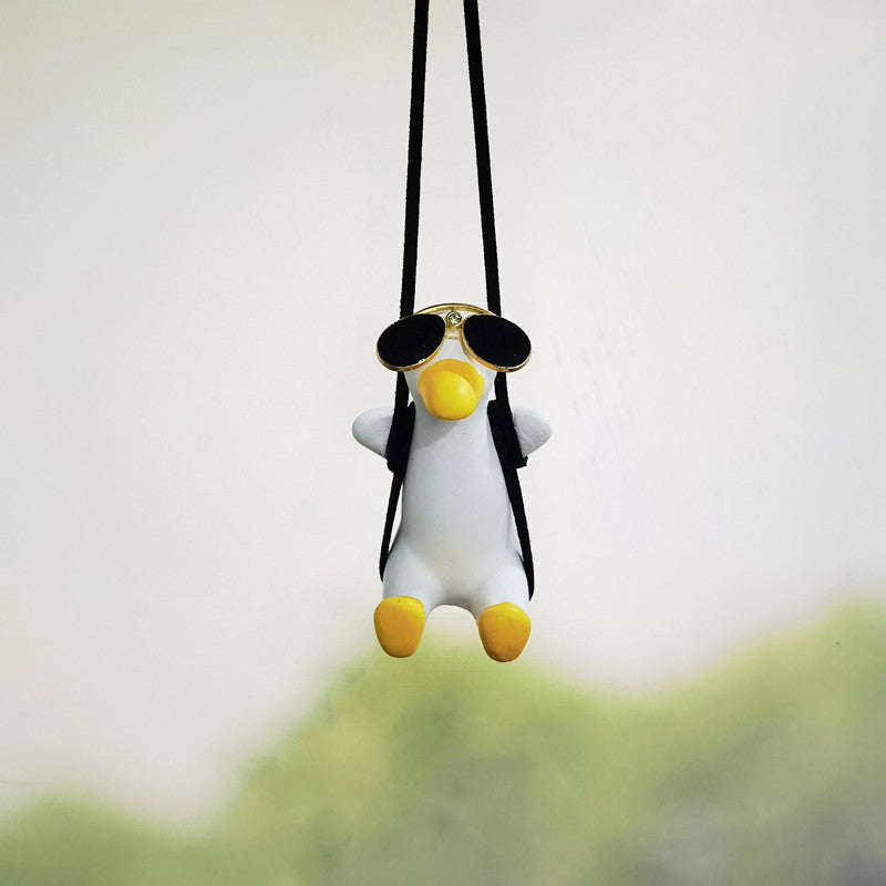 SwingDuck rearview mirror charm — thin yellow duck in sunglasses