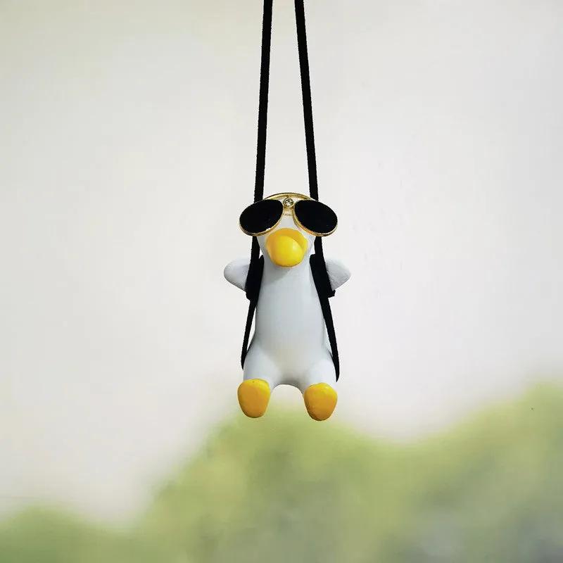SwingDuck rearview mirror charm — thin yellow duck in sunglasses