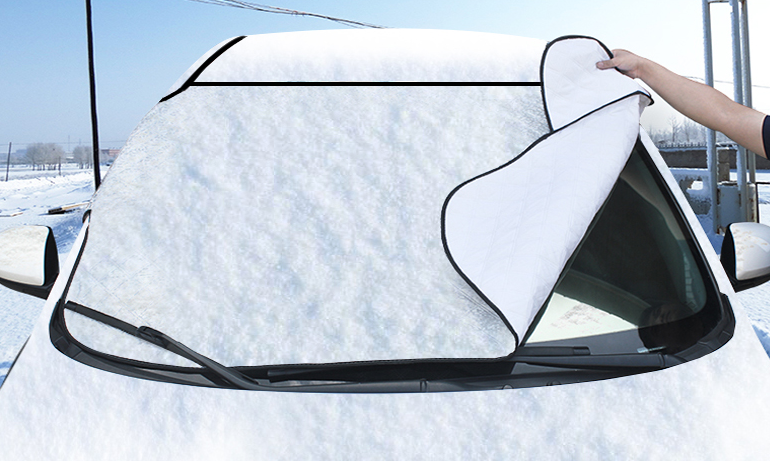 Peeling the cover off with snow attached