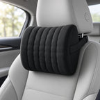 Memory-foam neck cushion fitted on a car headrest