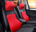 Memory foam lumbar pillow supporting the lower back in a car seat