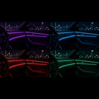 Fiber optic ambient light shown in four colours, purple, blue, red and green, on the same car dashboard and door