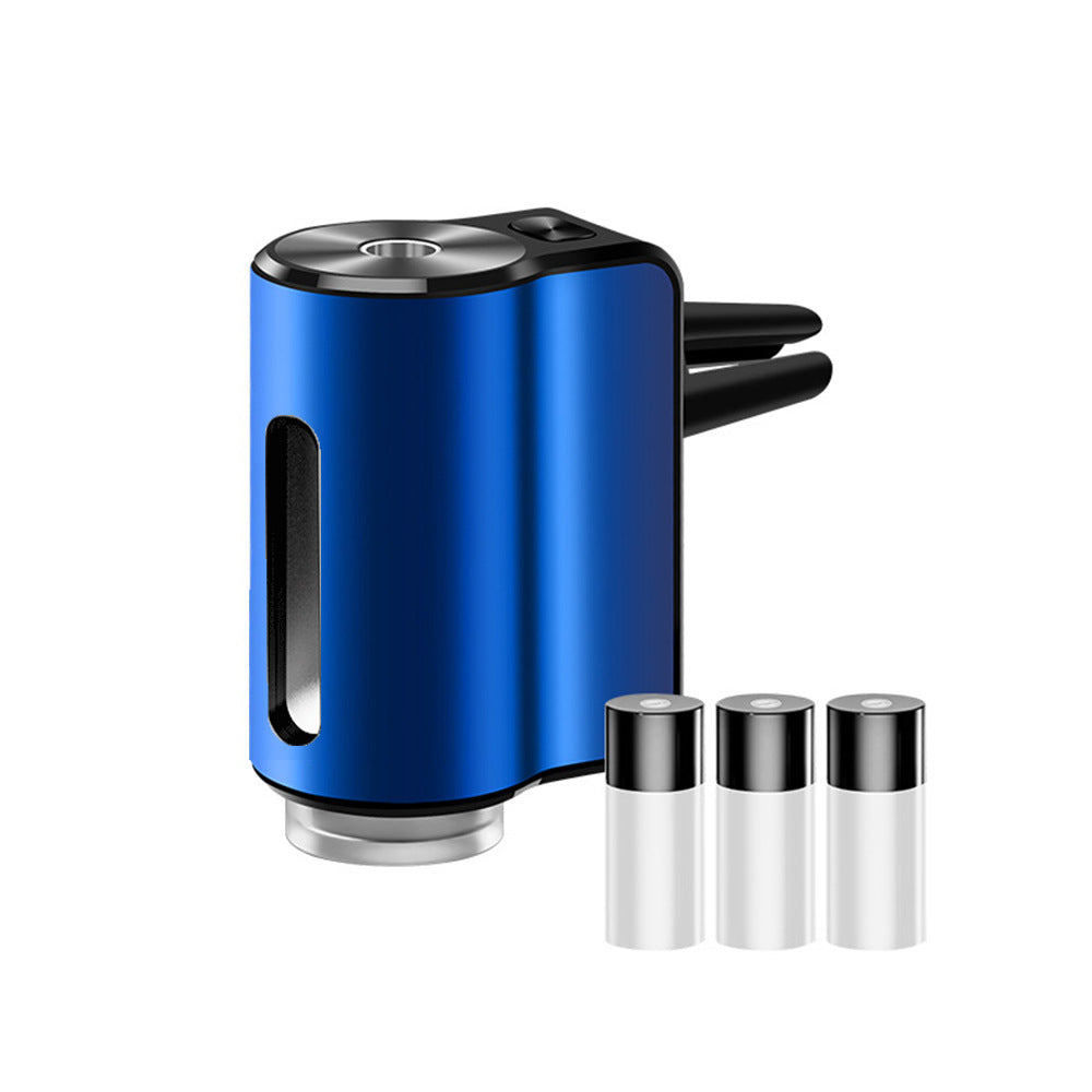 AromaDrive smart car diffuser in sapphire blue, with three essential oil bottles