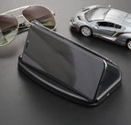 Heads-up display projector in black with wireless charging