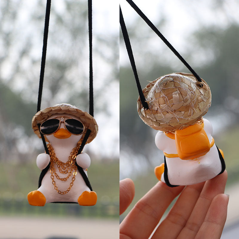 SwingDuck rearview mirror charm — straw hat tyrant duck