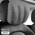 Elegant grey car headrest cushion fitted to a seat