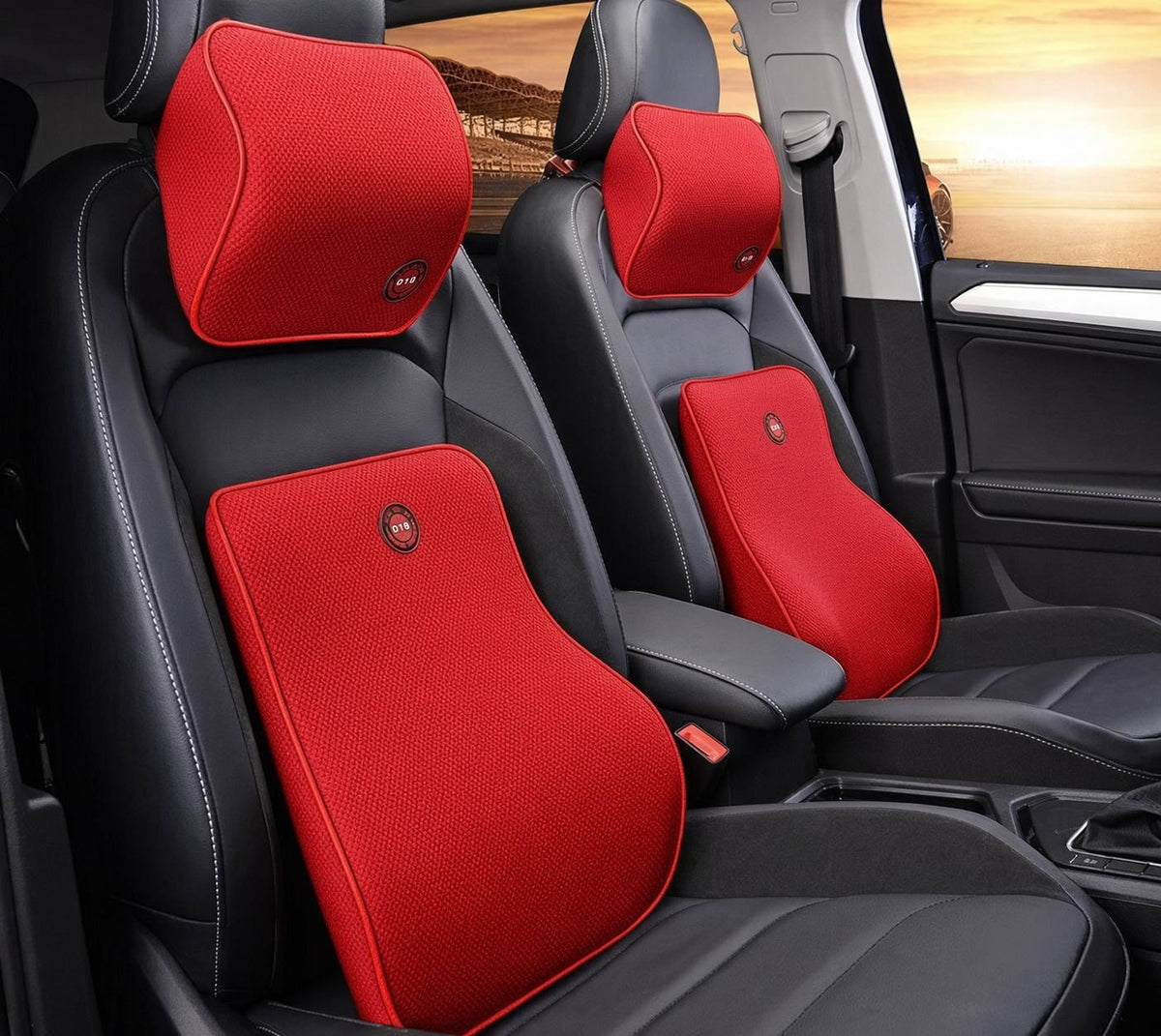 Red memory foam car headrest and lumbar support pillow set installed in a car