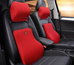Red memory foam car headrest and lumbar support pillow set installed in a car