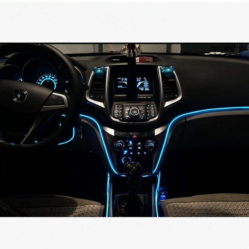 Ice-blue neon EL wire along the dash and door at night