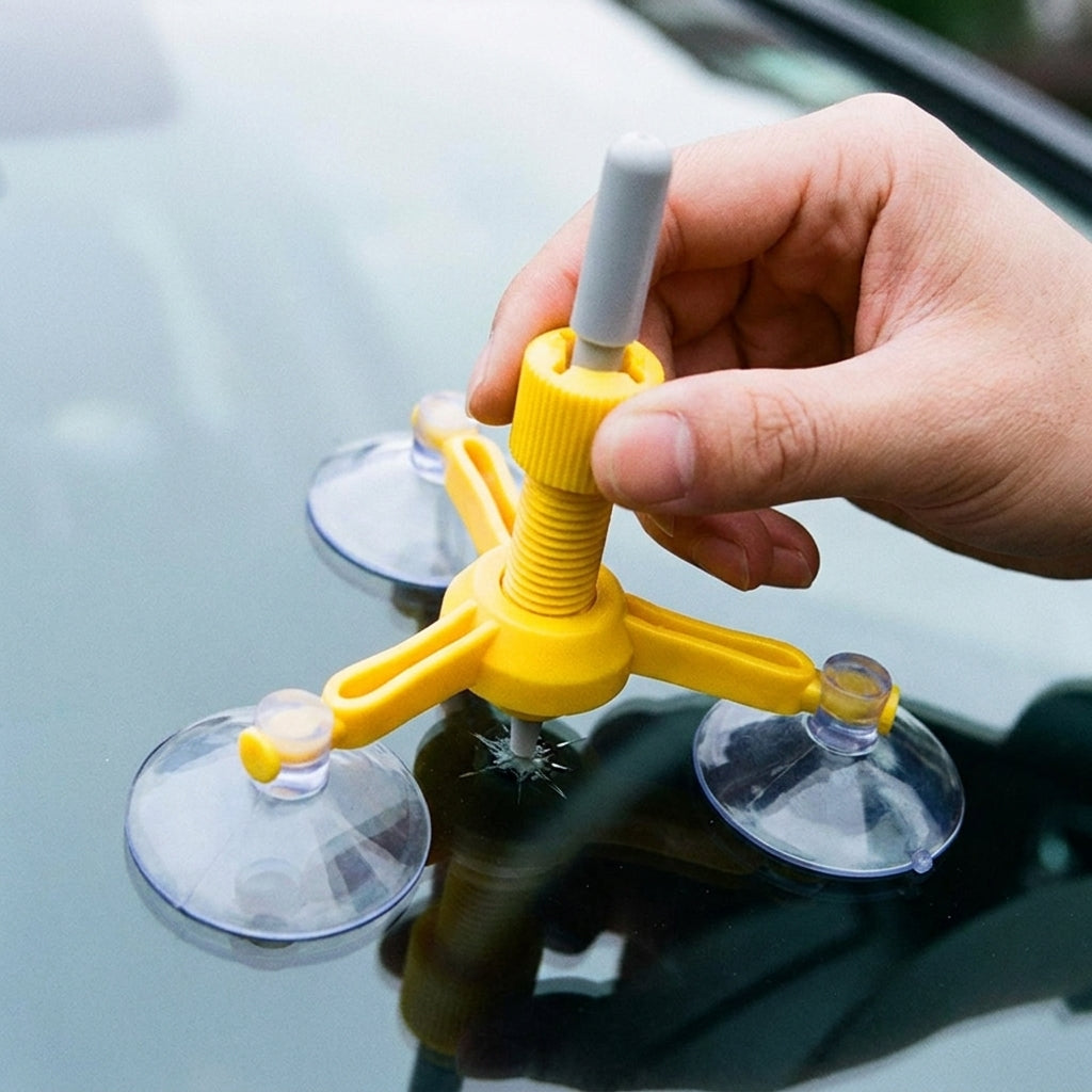 Car windshield chip and scratch repair kit being used on a windscreen