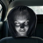 Funny creepy face car headrest cover stretched over a car headrest