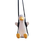 Rearview mirror charm on its swing