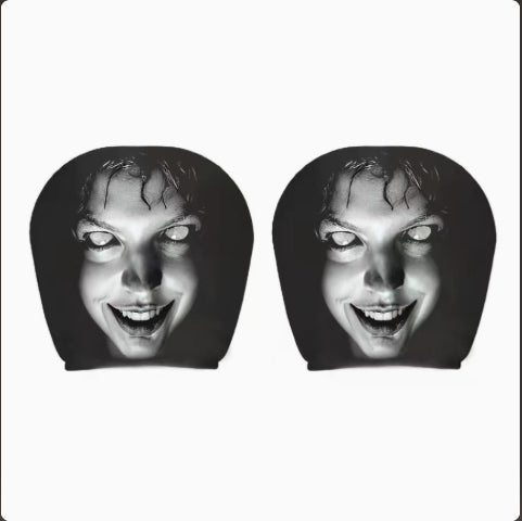 Eyeless laughing face car headrest cover, pack of two