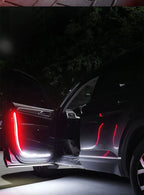 Dual-Color Car Ambient LED Strip in use — red and white strip lit along an open car door at night
