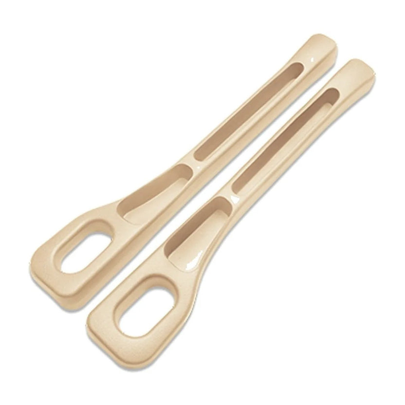 Beige — pair of car seat gap filler strips on a white background