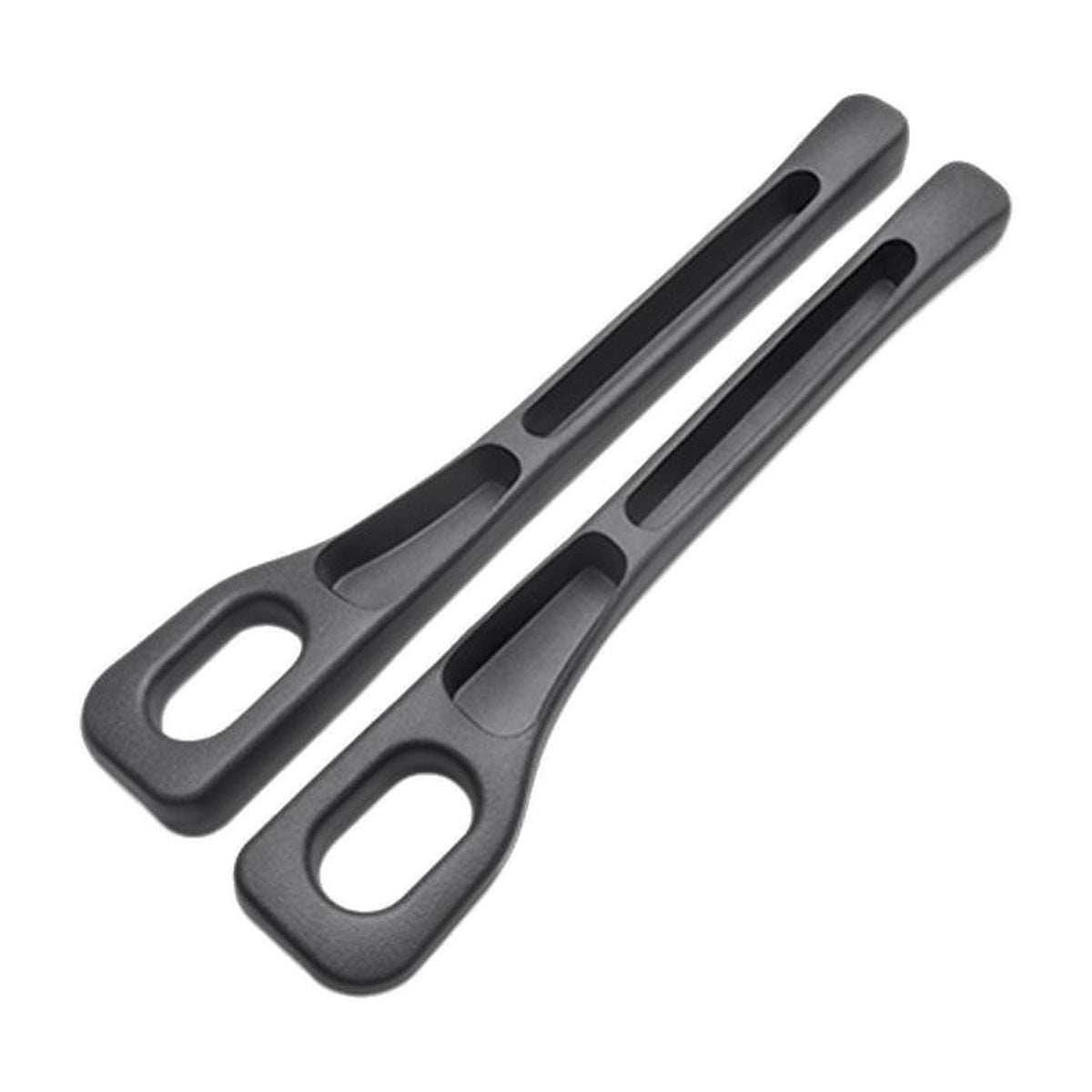 Black — pair of car seat gap filler strips on a white background