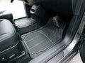 Heavy-duty rubber car floor mats, 4-piece set, fitted in a car footwell