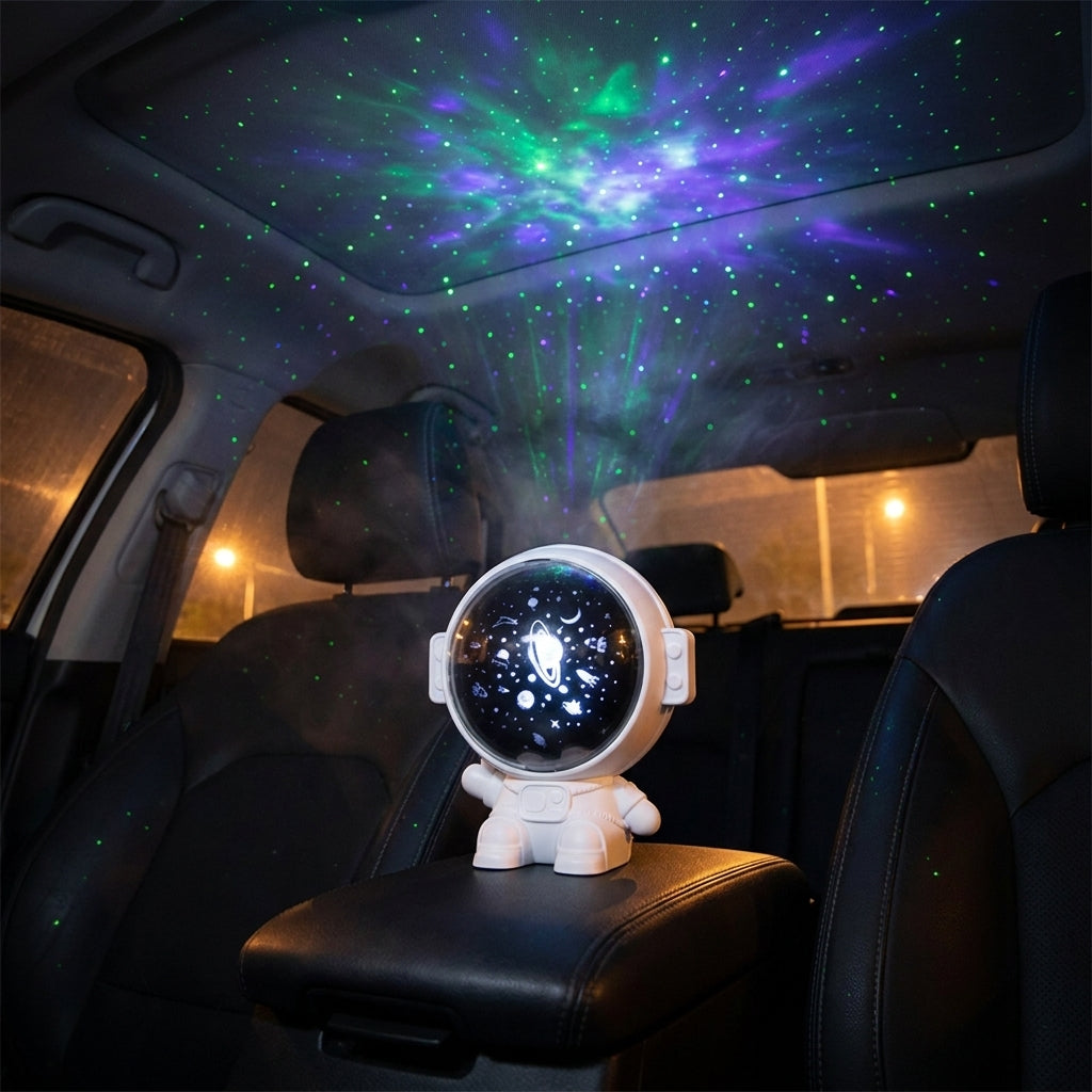 Astronaut galaxy car roof projector casting stars across a car ceiling